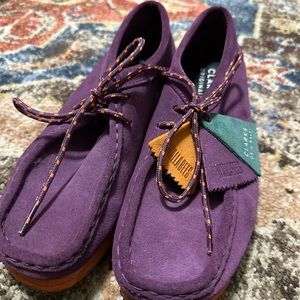 Women’s size 9 Wallabee’s in Purple and Orange.